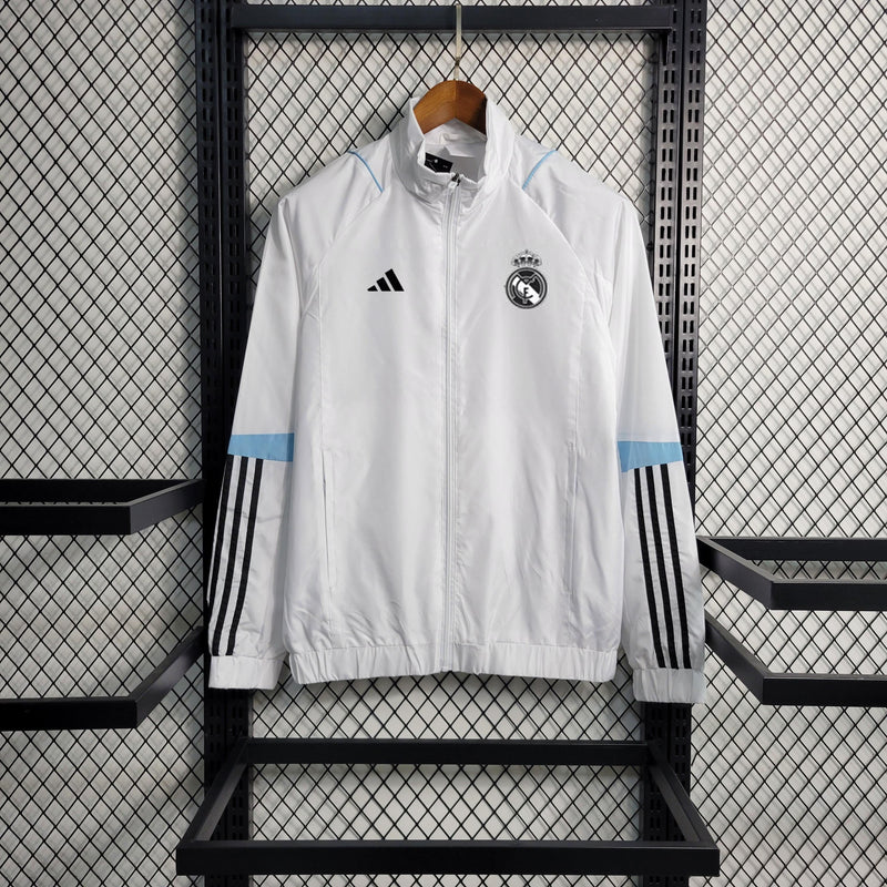 Cortaviento Real Madrid Blanca con Detalles en Azul 23/24